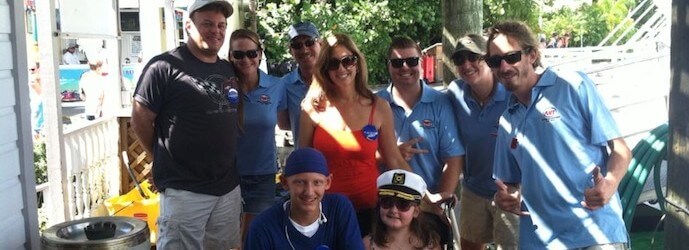 Family ready to board Fury's glass bottom boat for the Make-A-Wish Foundation