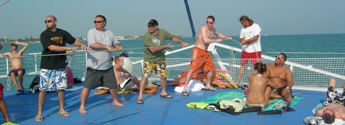 People aboard a Fury boat pulling a rope