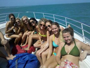 Friends aboard a boat in sunny Key West during spring break
