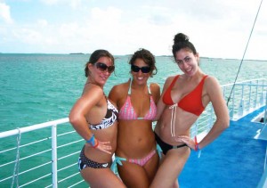 Fury Girl (center) and her friends partying it up on a snorkel trip.