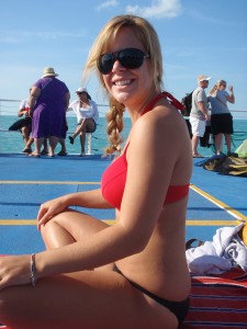 Woman enjoying a boat ride with Fury in Key West