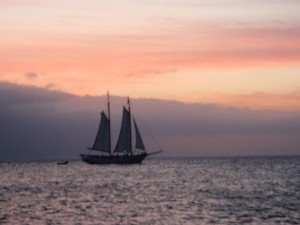 Boat sailing with a beautiful sunset in Key West
