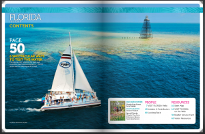 Magazine page with Fury catamaran on the ocean