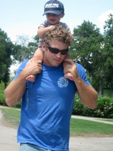 Liam enjoying a piggy-back ride with his dad Stephen