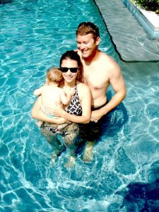 Stephen, his wife Krissy and his son Liam enjoy a pool day