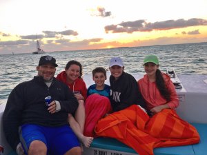 Image of family on the Fury Dolphin Watch and Snorkel Tour