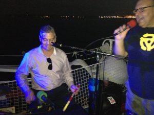 The Cory Heydon Band playing at a Fury boat at night