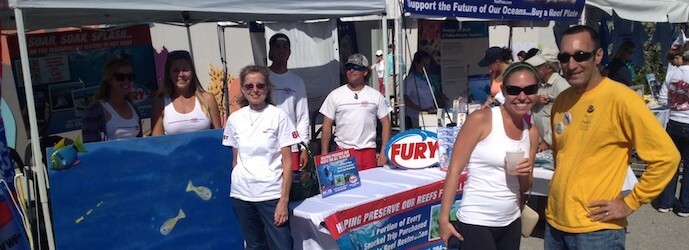 People by the fury booth in Key West