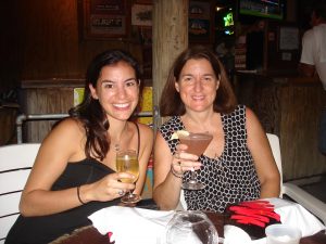 Monica and her mom taking a drink in Key West.