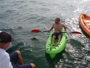 Tourist in the water ready to do some kayaking in Key West