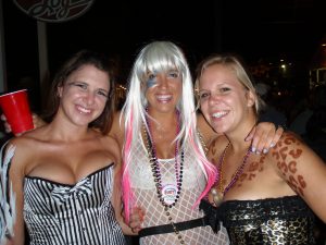Women dressed as Zebra, Gaga, and Cheetah