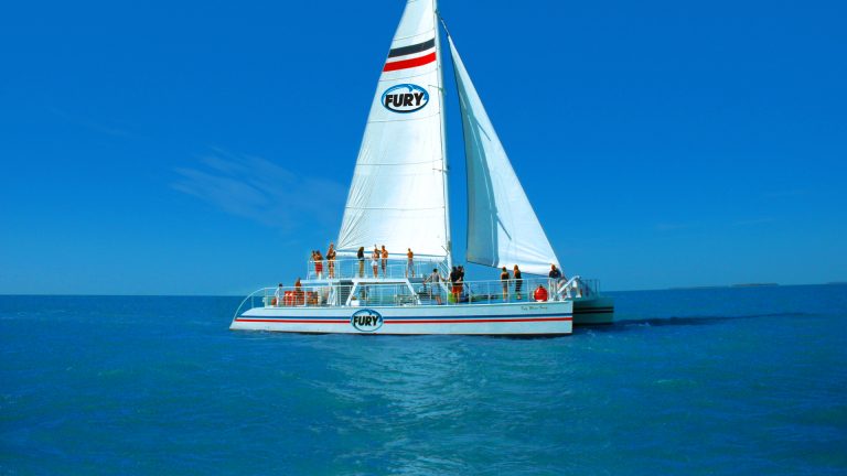 People aboard the Fury sail boat in sunny Key West