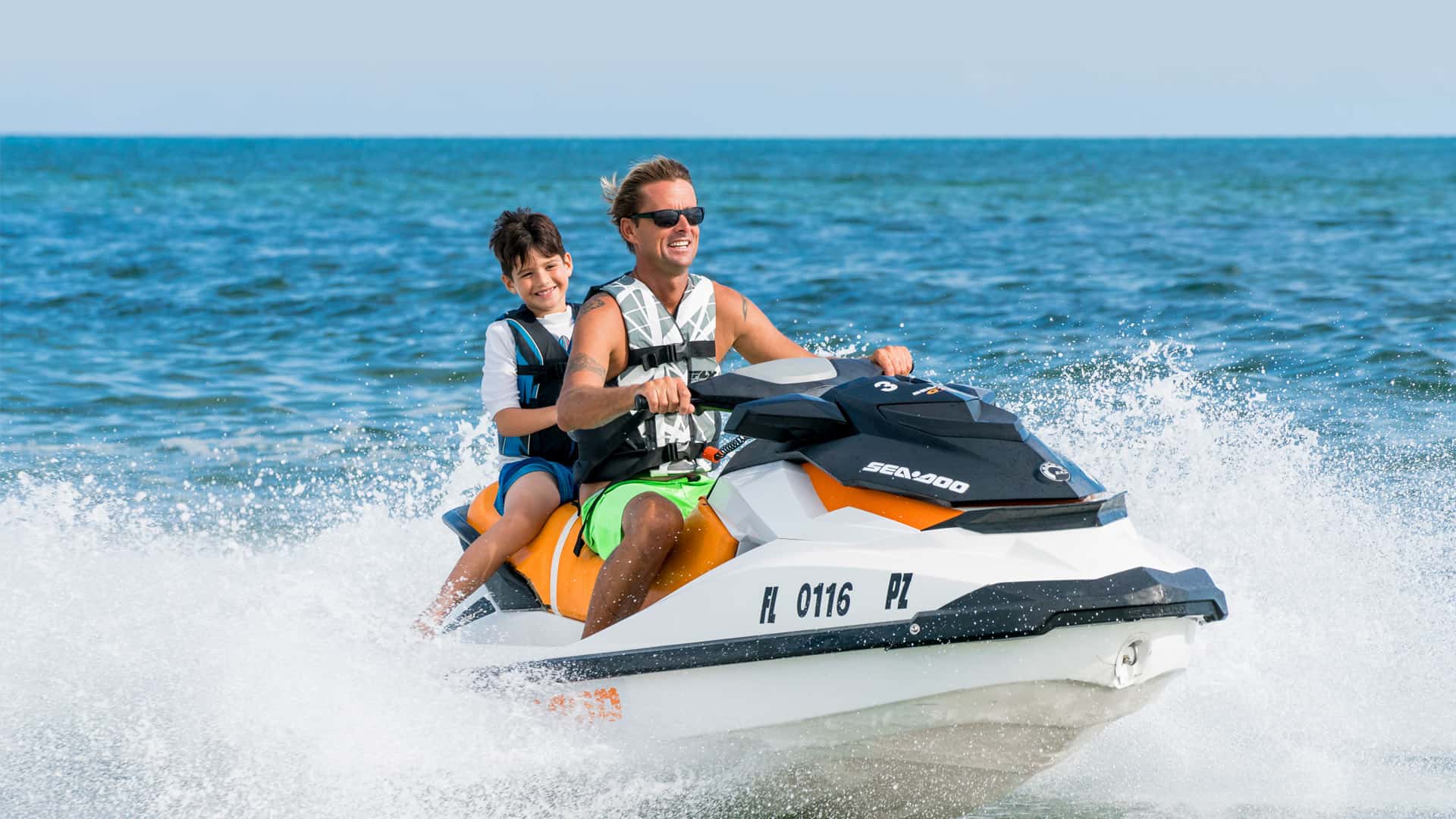 people riding jet skiis in Key West
