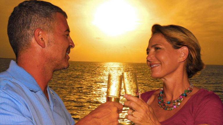 Couple drinking champagne on the sunset cruise in Key West