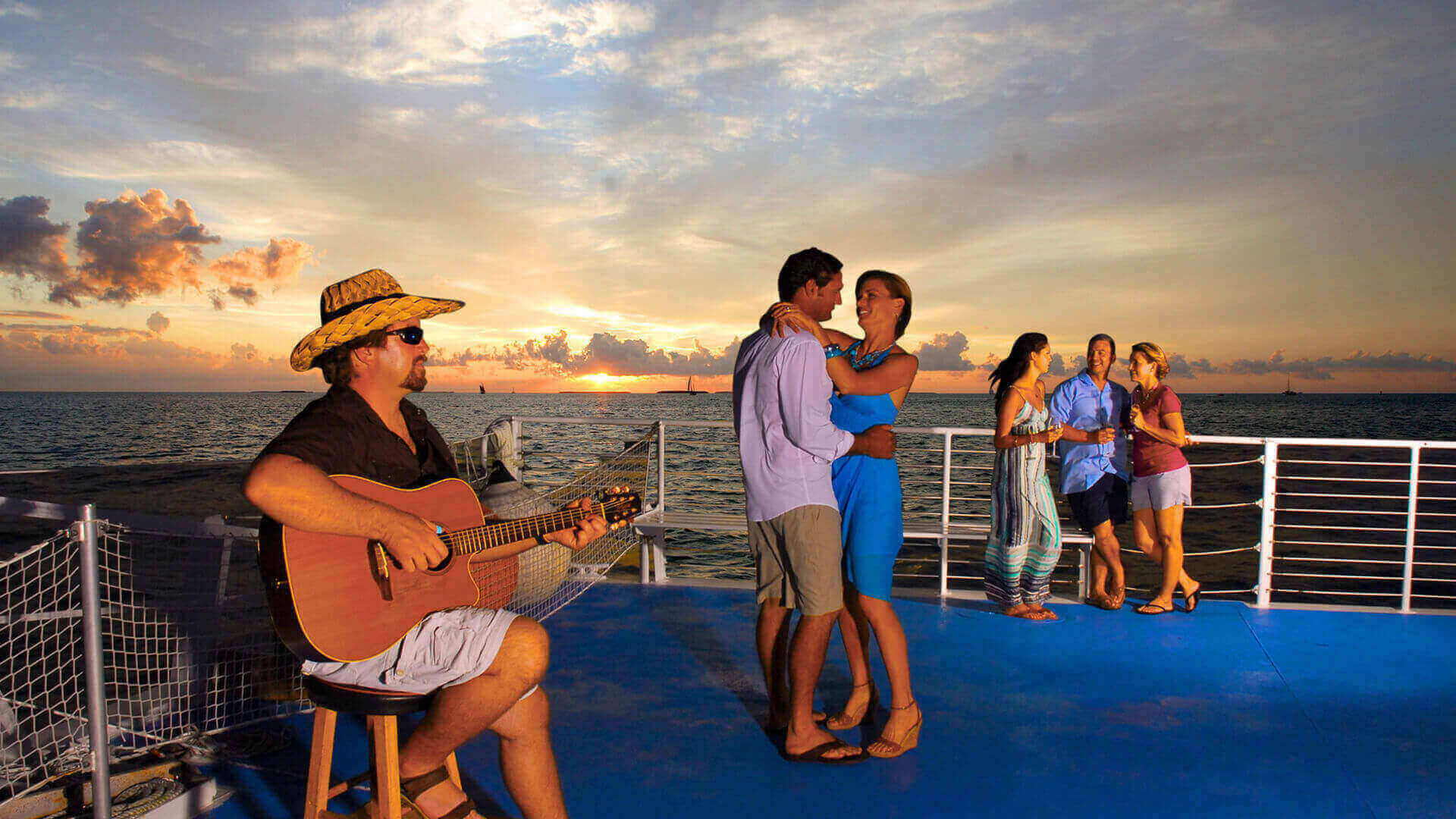 People dancing on the Fury Live Music Sunset Cruise in Key West
