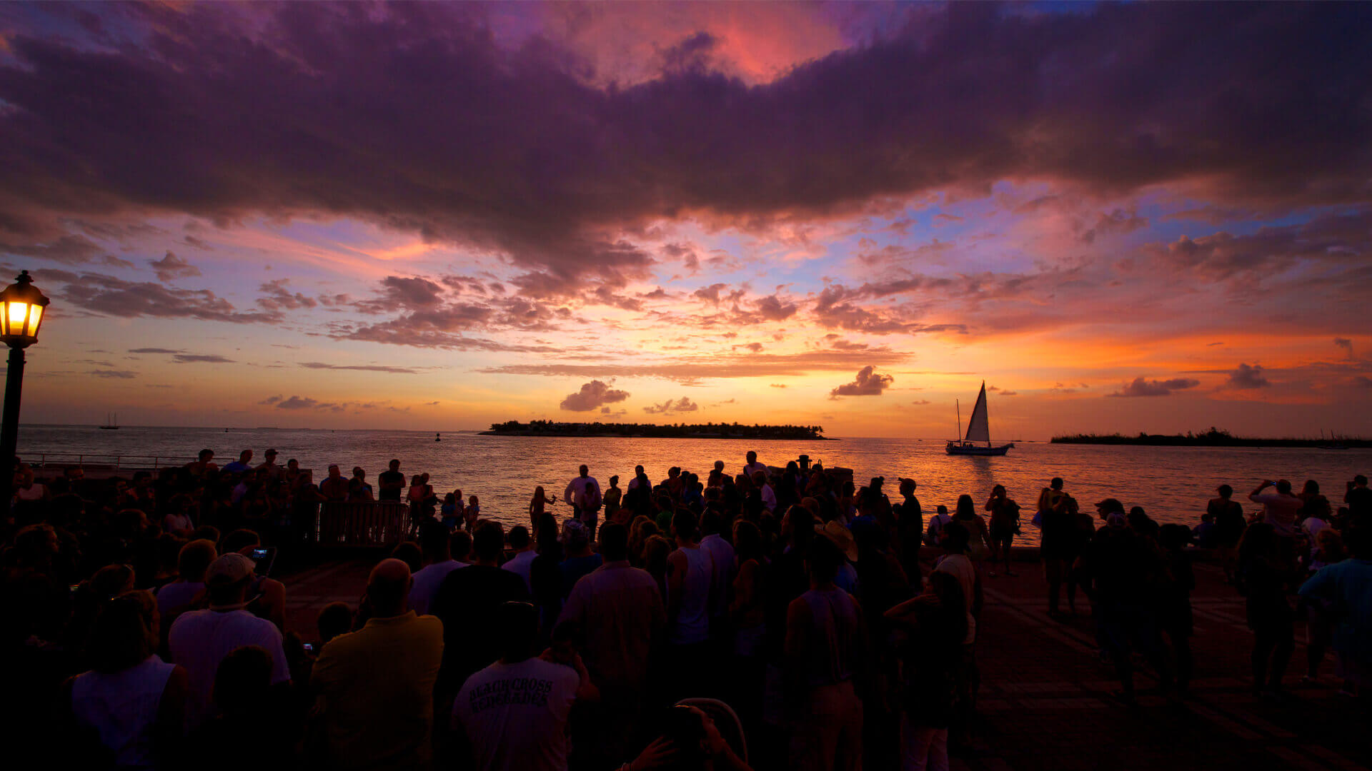 Image of a gathering viewing the sunset celebration a thing to do outside