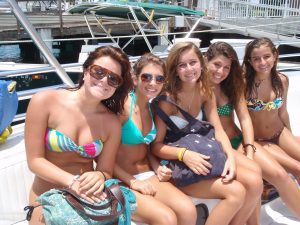 Young girls aboard a Fury boat for spring break